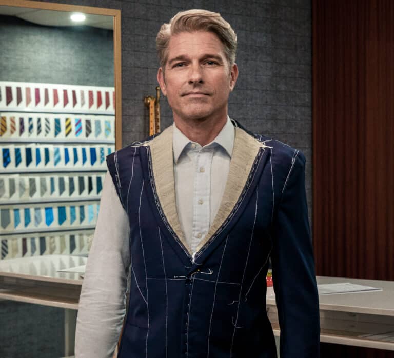 Client wearing a basted fitting bespoke jacket with canvas exposed