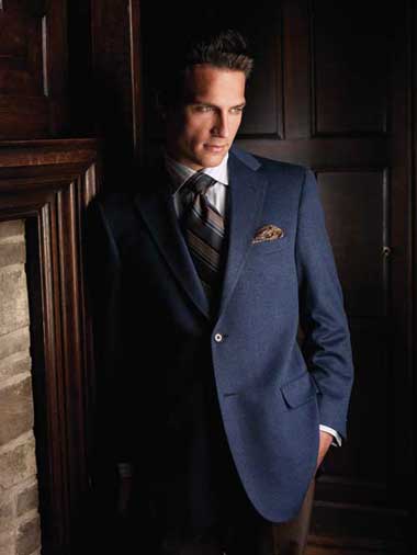 Client in navy blue blazer with striped tie