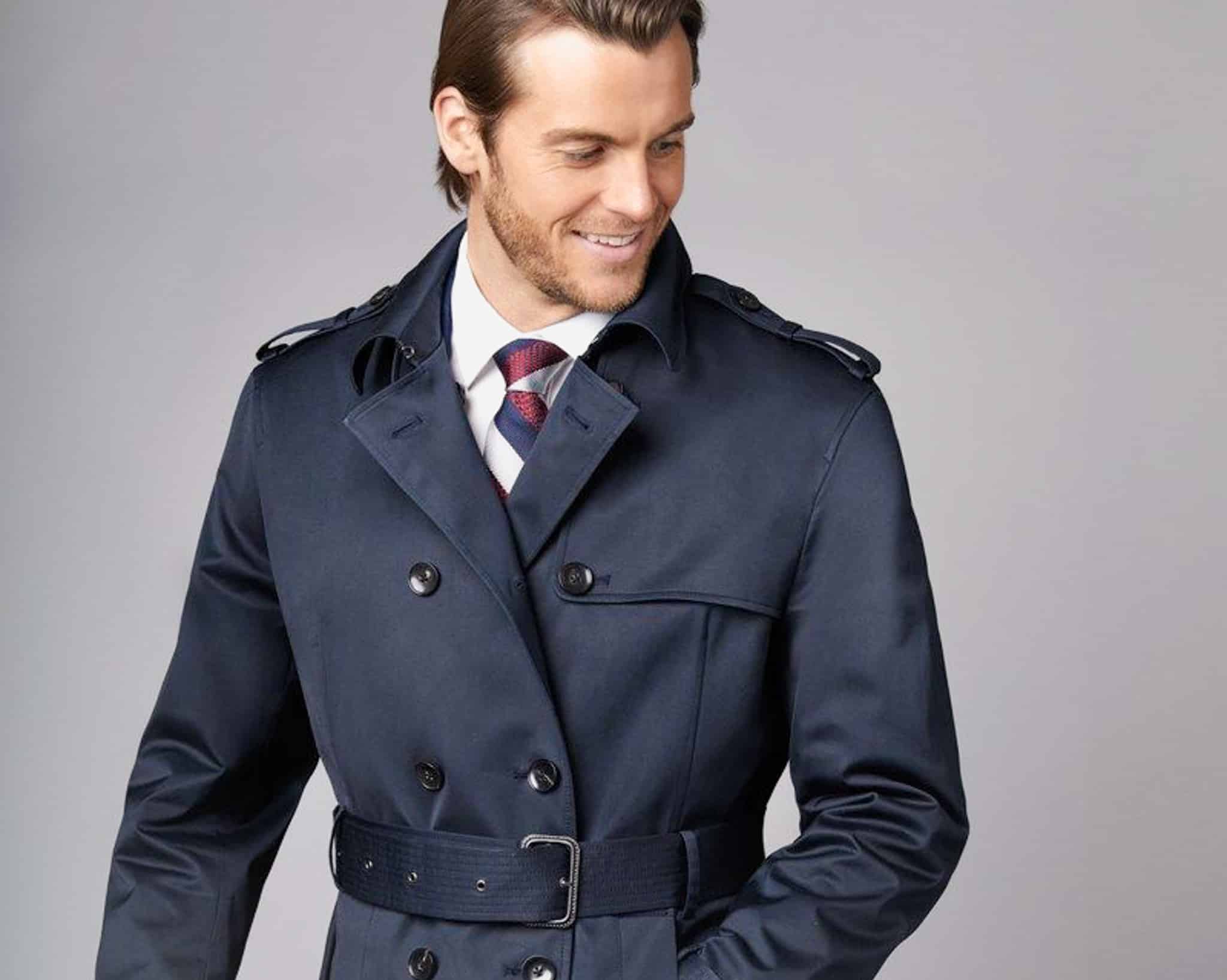 Model in double breasted custom raincoat