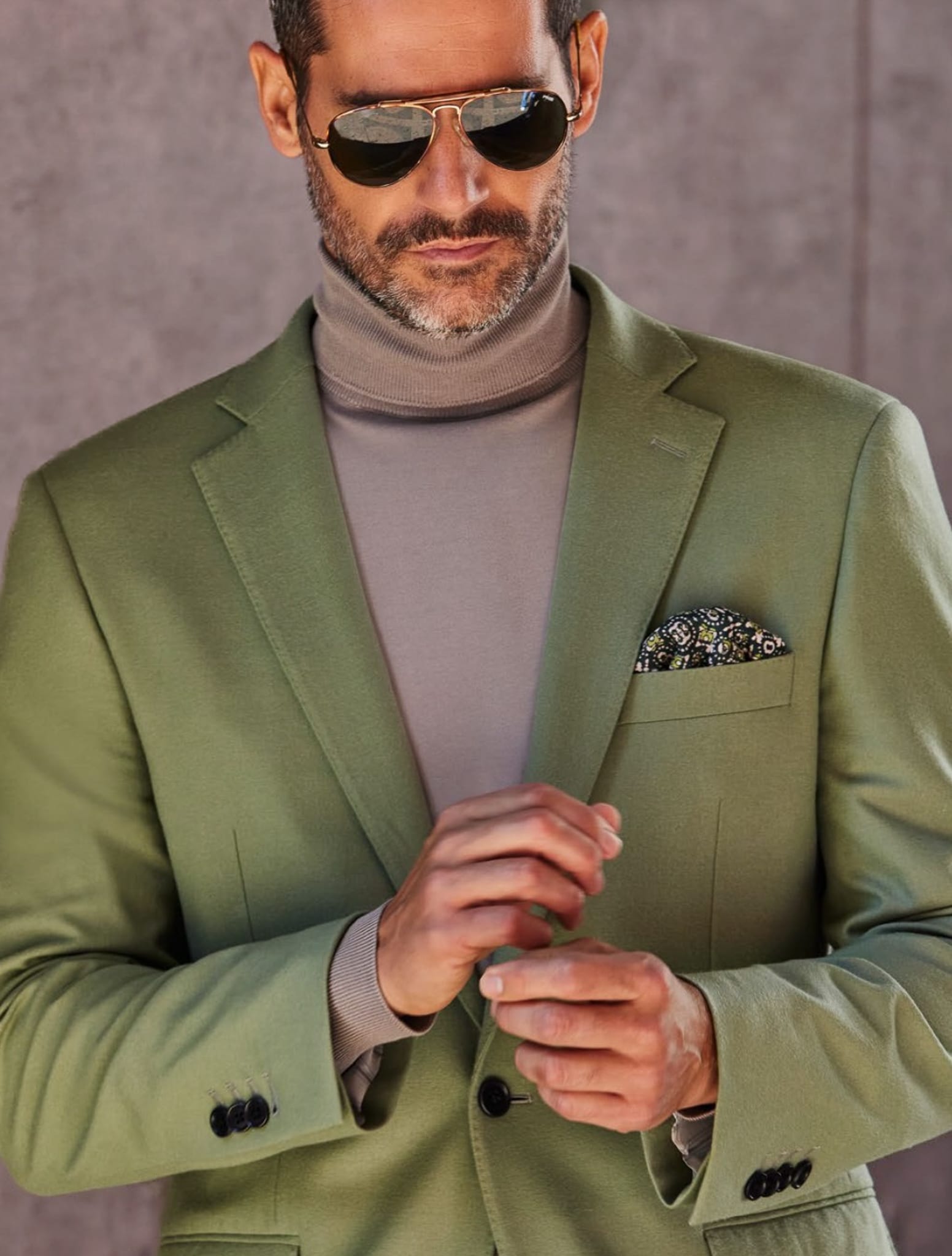 Classic solid green Loro Piana bespoke sportscoat with brown turtleneck.