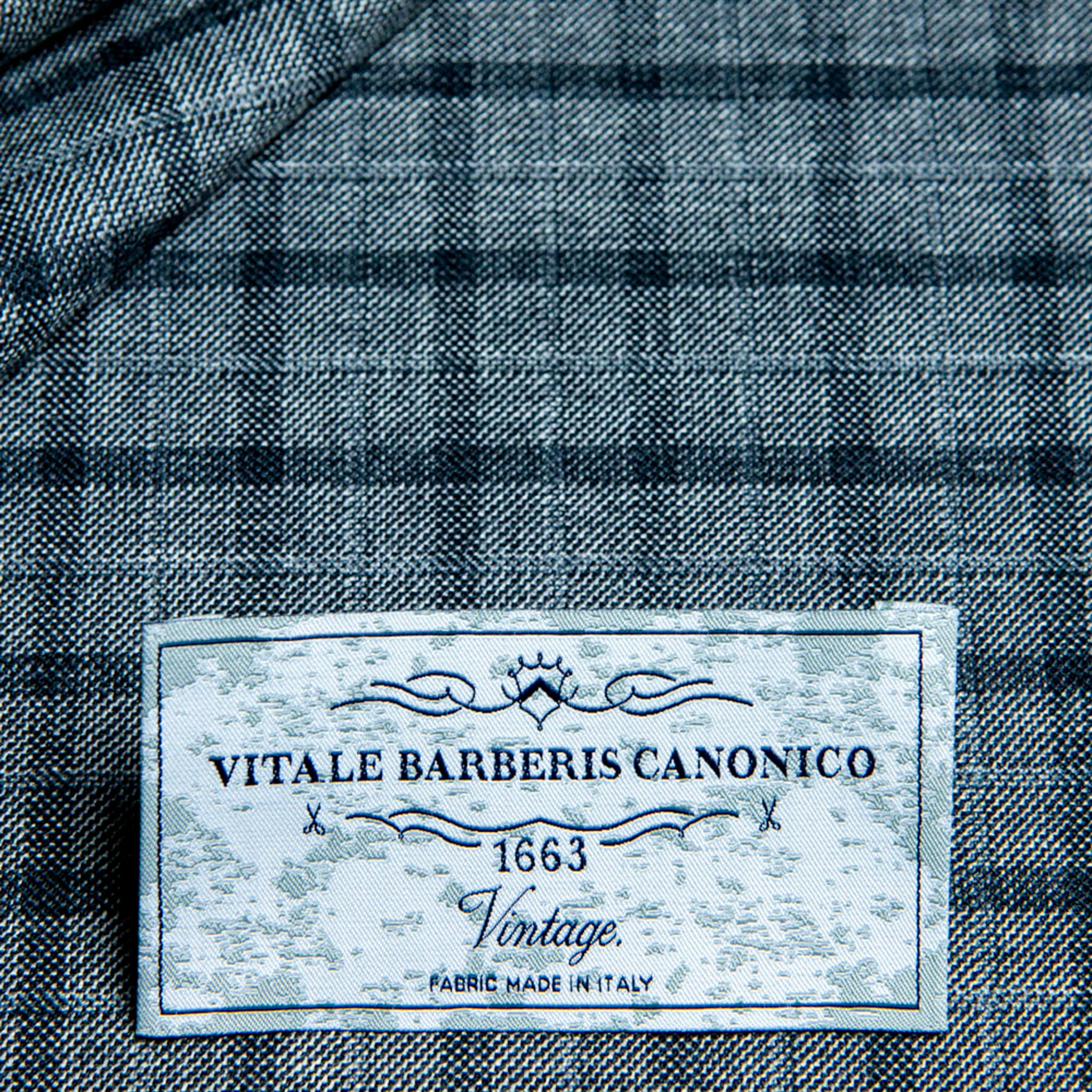 Vitale Barberis light grey with black windowpane trouser fabric swatch.