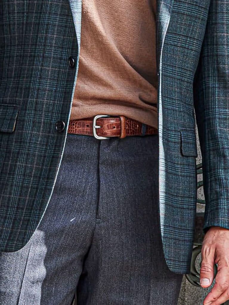 Client in grey bespoke trousers.
