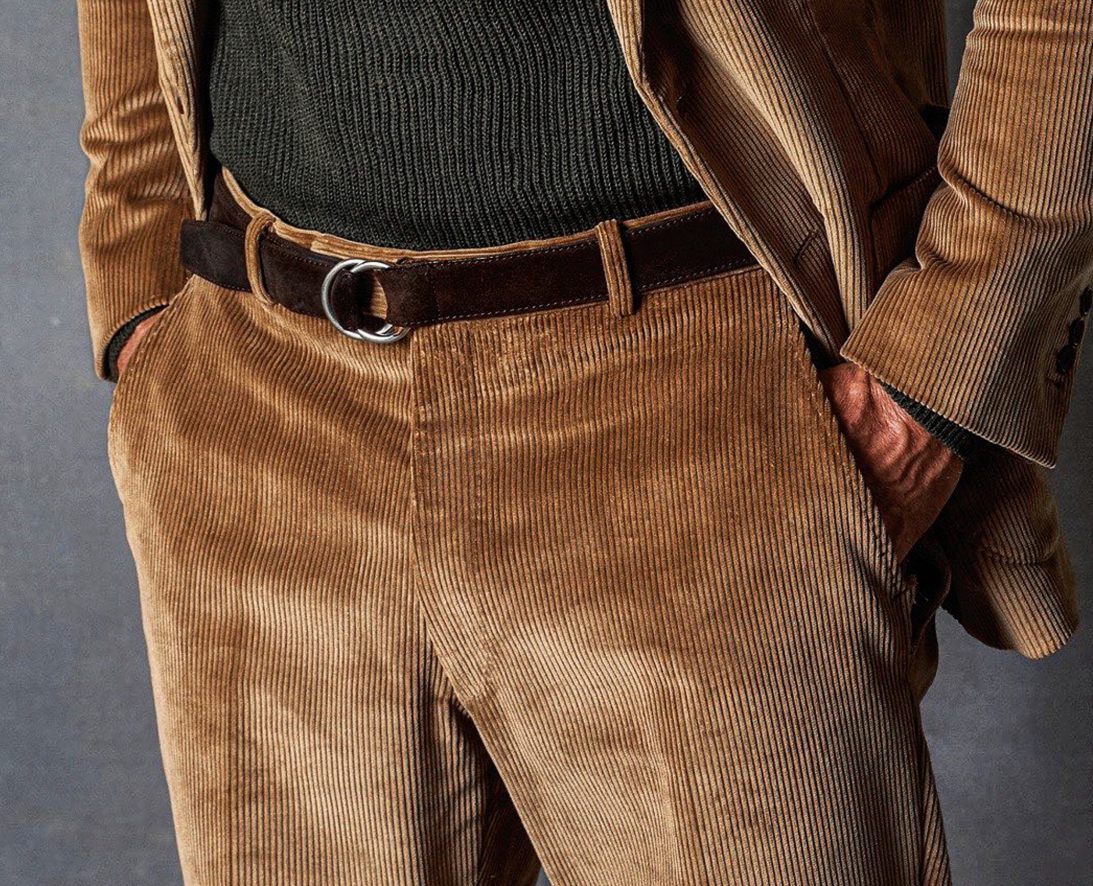 Client wearing brown corduroy custom made dress trousers fabric by Holland & Sherry.