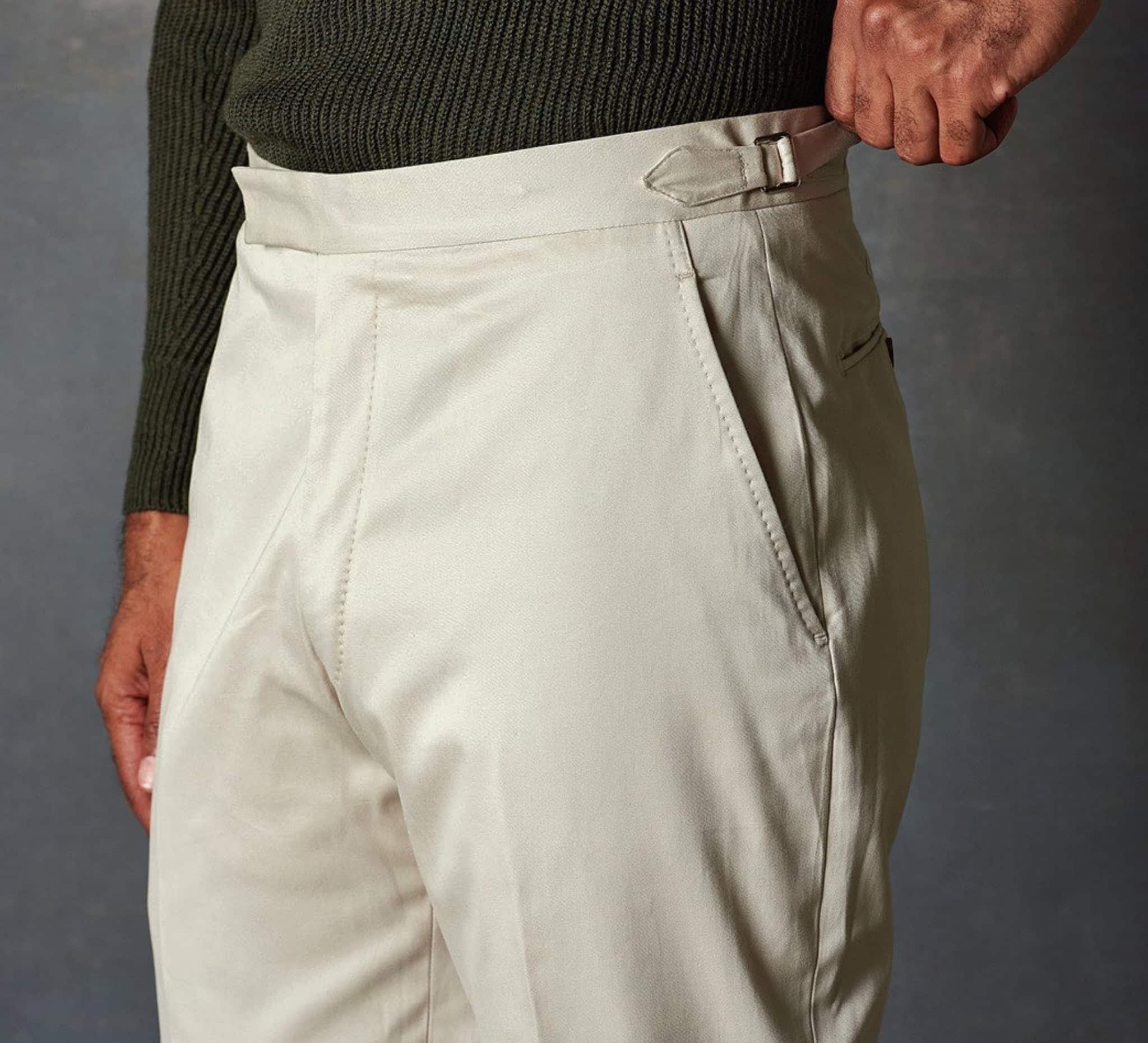 Client in solid khaki casual bespoke trousers.