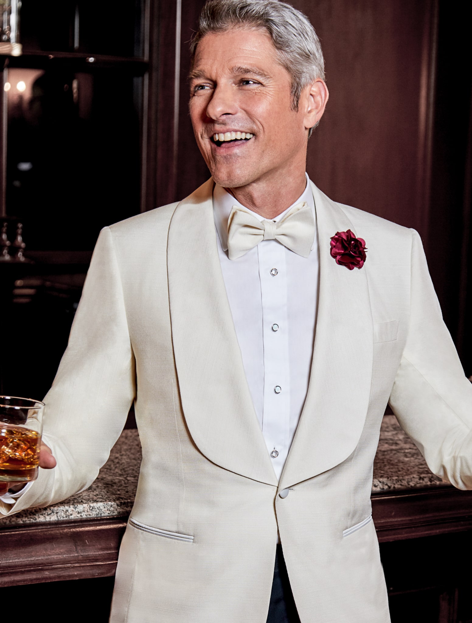 Loro Piana white custom dinner jacket with wide 3 inch shawl lapel. White shirt and white satin bowtie.